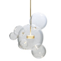 Design fantaisie plaqué or corps clair bulle ronde boule de verre suspension lampes suspendues pour salon